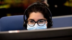 How can I talk to a real person when phoning the IRS helpline?