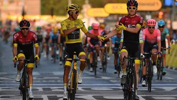 Cycling Tour de France - Stage 21
 
 28 July 2019, France, Paris: Colombian cyclist Egan Bernal (C) of Team Ineos in the yellow jersey of the leader in the overall ranking and British cyclist Geraint Thomas (R) of Team Ineos cross the finish line of the 2