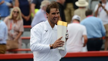 Tennis - Rogers Cup Montreal
11 August 2019, Canada, Montreal: Spanish tennis player Rafael Nadal celebrates with the trophy after defeating Russia's Daniil Medvedev (not pictured) during their men's final tennis match of the Rogers Cup Montr