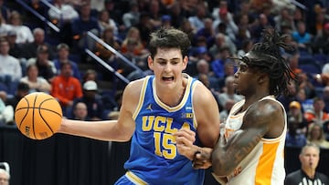 Aday Mara #15 of the UCLA Bruins drives to the basket against Felix Okpara #34 of the Tennessee Volunteers during the second half in the second round of the NCAA Men's Basketball Tournament at Rupp Arena on March 22, 2025 in Lexington, Kentucky.