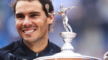 A triumphant Rafa Nadal pictured holding the Trofeo Conde de God&oacute; in Barcelona today.