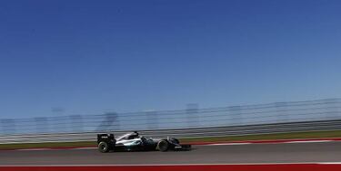 Hamilton, oblivious to late night tinkering as he takes pole
