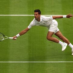 Why do they play on a grass surface at Wimbledon?