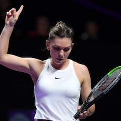Halep salva una bola de partido ante Andreescu y gana