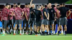 Soccer Football - FIFA World Cup Qatar 2022 - Qatar Training - Aspira Zone Training Facilities 3, Doha, Qatar - November 19, 2022 Qatar coach Felix Sanchez with players and coaching staff during training REUTERS/Ibraheem Al Omari