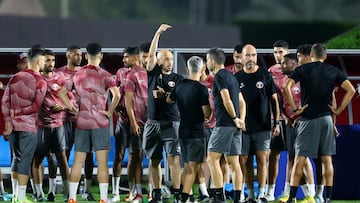 Soccer Football - FIFA World Cup Qatar 2022 - Qatar Training - Aspira Zone Training Facilities 3, Doha, Qatar - November 19, 2022 Qatar coach Felix Sanchez with players and coaching staff during training REUTERS/Ibraheem Al Omari