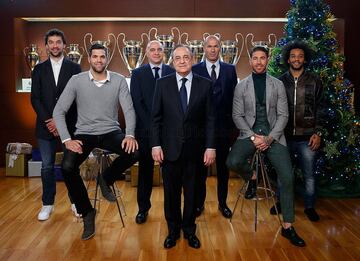 Sergio Llull, Felipe Reyes, Pablo Laso, Florentino Pérez, Zinedine Zidane, Sergio Ramos y Marcelo.