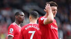 MANCHESTER, ENGLAND - APRIL 16: Paul Pogba of Manchester United talks to Cristiano Ronaldo of Manchester United during the Premier League match between Manchester United and Norwich City at Old Trafford on April 16, 2022 in Manchester, United Kingdom. (Photo by Robbie Jay Barratt - AMA/Getty Images)