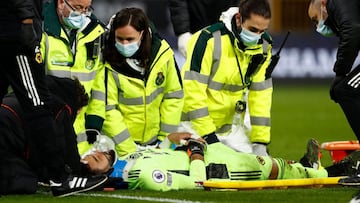 Wolverhampton Wanderers&#039; Portuguese goalkeeper Rui Patricio receives medical treatment for  head injury during the English Premier League football match between Wolverhampton Wanderers and Liverpool at the Molineux stadium in Wolverhampton, central E