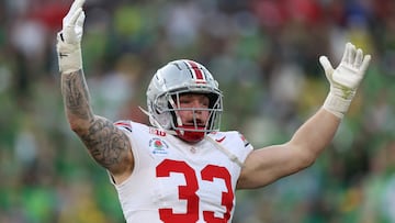 PASADENA, CALIFORNIA - JANUARY 01: Jack Sawyer #33 of the Ohio State Buckeyes reacts after a sack during the Rose Bowl game against the Oregon Ducks at Rose Bowl Stadium on January 01, 2025 in Pasadena, California. Sean M. Haffey/Getty Images/AFP (Photo by Sean M. Haffey / GETTY IMAGES NORTH AMERICA / Getty Images via AFP)
