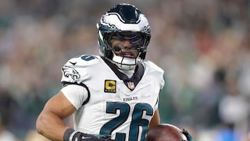 INGLEWOOD, CALIFORNIA - DECEMBER 08: Saquon Barkley #26 of the Philadelphia Eagles runs for a fourth quarter touchdown against the Los Angeles Chargers at SoFi Stadium on December 08, 2025 in Inglewood, California. Ronald Martinez/Getty Images/AFP (Photo by RONALD MARTINEZ / GETTY IMAGES NORTH AMERICA / Getty Images via AFP)