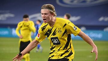 Dortmund's Norwegian forward Erling Braut Haaland celebrates scoring the 4-0 goal during the German first division Bundesliga football match FC Schalke 04 vs Borussia Dortmund in Gelsenkirchen, western Germany, on February 20, 2021. (Photo by Ina Fas