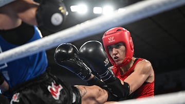 Mexico's Laura Fernanda Burgos Lopez (R) fights against Slovakia's Monika Chochlikova (L) in the women's 54kg Muaythai semifinal during the 2025 World Games at the Sichuan Gymnasium in Chengdu, in China's southwestern Sichuan province on August 9, 2025. (Photo by Jade GAO / AFP)