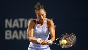 Aug 11, 2022; North York, ON, Canada; Qinwen Zheng (CHN) hits a backhand to Bianca Andreescu (not pictured) during third round play of the National Bank Open at Sobeys Stadium. Mandatory Credit: John E. Sokolowski-USA TODAY Sports