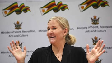 Zimbabwe's Sports Minister Kirsty Coventry speaks to the press gathered to welcome her on her arrival back home at the Robert-Mugabe International Airport after her recent appointment as International Olympic Committee (IOC) president, on March 23, 2025. (Photo by Jekesai NJIKIZANA / AFP)