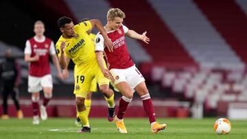 06 May 2021, United Kingdom, London: Villarreal's Francis Coquelin (L) and Arsenal's Martin Odegaard battle for the ball during the UEFA Europa League Semi-Final second leg soccer match between Arsenal FC and Villarreal CF. Photo: John Walton/PA