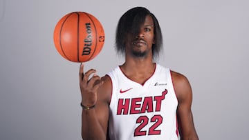 Miami Heat star Jimmy Butler donned an "emo" look with straightened hair, facial piercings, and black nails for Media Day. What statement was he making?