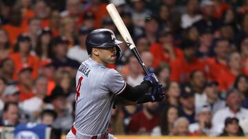 HOUSTON, TEXAS - OCTOBER 08: Carlos Correa #4 of the Minnesota Twins hits a two-run RBI single against the Houston Astros during the fifth inning in Game Two of the Division Series at Minute Maid Park on October 08, 2023 in Houston, Texas.   Bob Levey/Getty Images/AFP (Photo by Bob Levey / GETTY IMAGES NORTH AMERICA / Getty Images via AFP)