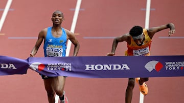 World Athletics Championships Tokyo 2025 - Men's Marathon Final - Japan National Stadium, Tokyo, Japan - September 15, 2025 Tanzania's Alphonce Felix Simbu crosses the finish line to win the men's marathon final ahead of second placed Germany's Amanal Petros REUTERS/Dylan Martinez TPX IMAGES OF THE DAY