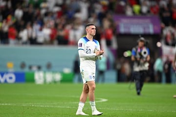 AL KHOR, QATAR - DECEMBER 04: Phil Foden (20) of England celebrates at the end of the FIFA World Cup Qatar 2022 Round of 16 match between England and Senegal at Al Bayt Stadium in Al Khor, Qatar on December 04, 2022. (Photo by Ercin Erturk/Anadolu Agency via Getty Images)