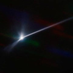 Why is the C/2022 E3 (ZTF) comet green? What does the comet’s name code represent?