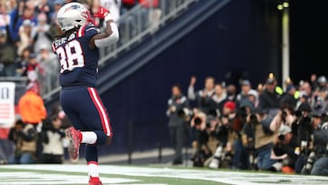 Rhamondre Stevenson #38 of the New England Patriots celebrates his third quarter touchdown against the Cleveland Browns at Gillette Stadium on November 14, 2021 in Foxborough, Massachusetts.