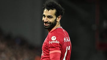 Liverpool&#039;s Egyptian midfielder Mohamed Salah reacts during the English Premier League football match between Liverpool and Manchester United at Anfield in Liverpool, north west England on April 19, 2022. (Photo by Oli SCARFF / AFP) / RESTRICTED TO E