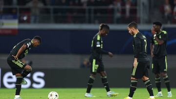 LEIPZIG, GERMANY - OCTOBER 25: Eden Hazard and players of Real Madrid react after Timo Werner of RB Leipzig ( not pictured ) scores their side's third goal during the UEFA Champions League group F match between RB Leipzig and Real Madrid at Red Bull Arena on October 25, 2022 in Leipzig, Germany. (Photo by Maja Hitij/Getty Images)