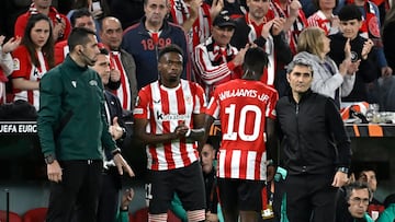 Athletic Bilbao's Spanish forward #10 Nico Williams (back) celebrates scoring his team's second goal with Athletic Bilbao's Spanish midfielder #11 Alvaro Djalo during the UEFA Europa League quarter final second leg football match between Athletic Club Bilbao and Glasgow Rangers, at the San Mames stadium in Bilbao on April 17, 2025. (Photo by ANDER GILLENEA / AFP)