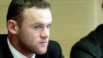 Wayne Rooney y Fabio Capello esperan a que comience la vista de apelación hoy en Nyon.