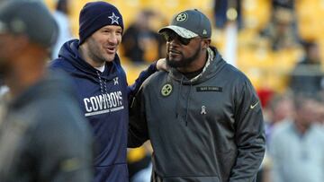 Nov 13, 2016; Pittsburgh, PA, USA; Dallas Cowboys quarterback Tony Romo (left) and Pittsburgh Steelers head coach Mike Tomlin talk before their game at Heinz Field. Mandatory Credit: Jason Bridge-USA TODAY Sports