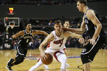 Basketball - NBA Global Games - Brooklyn Nets v Miami Heat - Arena Mexico, Mexico City, Mexico December 9, 2017. Goran Dragic of Miami Heat and Timofey Mozgov of Brooklyn Nets in action. REUTERS/Edgard Garrido