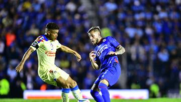 Jonathan Dos Santos (L) of America fights for the ball with Gonzalo Piovi (R) of Cruz Azul during the final first leg match between Cruz Azul and America as part of the Torneo Clausura 2024 Liga BBVA MX at Ciudad de los Deportes Stadium on May 23, 2024 in Mexico City, Mexico.