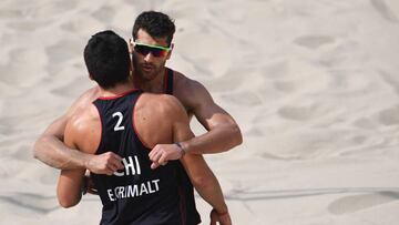 RIO DE JANEIRO, BRAZIL - AUGUST 07:  Marco Grimalt and Esteban Grimalt of Chile react during the Men&#039;s Beach Volleyball preliminary round Pool E match against Reinder Nummerdor and Christiaan Varenhorst of the Netherlands on Day 2 of the Rio 2016 Olympic Games at the Beach Volleyball Arena on August 7, 2016 in Rio de Janeiro, Brazil.  (Photo by Shaun Botterill/Getty Images)