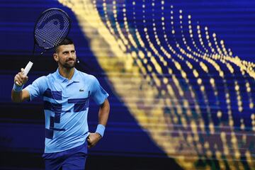 NEW YORK, NEW YORK - AUGUST 21: Novak Djokovic of Serbia acknowledges the crowd before playing with former professional tennis player John McEnroe of the United States (not pictured) against former professional tennis player Andre Agassi of the United States and Carlos Alcaraz of Spain (not pictured) during the Stars of the Open exhibition match at USTA Billie Jean King National Tennis Center on August 21, 2024 in the Flushing neighborhood of the Queens borough of New York City.   Sarah Stier/Getty Images/AFP (Photo by Sarah Stier / GETTY IMAGES NORTH AMERICA / Getty Images via AFP)