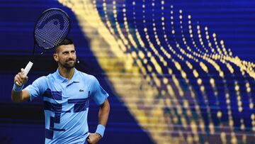 NEW YORK, NEW YORK - AUGUST 21: Novak Djokovic of Serbia acknowledges the crowd before playing with former professional tennis player John McEnroe of the United States (not pictured) against former professional tennis player Andre Agassi of the United States and Carlos Alcaraz of Spain (not pictured) during the Stars of the Open exhibition match at USTA Billie Jean King National Tennis Center on August 21, 2024 in the Flushing neighborhood of the Queens borough of New York City. Sarah Stier/Getty Images/AFP (Photo by Sarah Stier / GETTY IMAGES NORTH AMERICA / Getty Images via AFP)