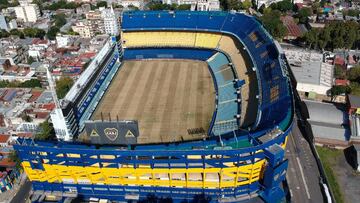 AME662. BUENOS AIRES (ARGENTINA), 06/04/2020.- Fotografía aérea del Estadio La Bombonera de Boca Juniors hoy lunes, luego de mas de 25 días desde que se paralizaran los torneos de fútbol como consecuencia del Covid-19 en Buenos Aires. La Bombonera, el mítico estadio de Boca Juniors, y las siempre concurridas y turísticas calles del barrio porteño de La Boca donde está emplazado lucen desoladas por la suspensión del torneo y la cuarentena obligatoria decretada en Argentina para evitar el contagio del coronavirus. EFE/Juan Ignacio Roncoroni
