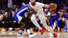 May 6, 2023; Los Angeles, California, USA; Los Angeles Lakers forward Anthony Davis (3) moves to the basket against Golden State Warriors forward JaMychal Green (1) during the first half in game three of the 2023 NBA playoffs at Crypto.com Arena. Mandatory Credit: Gary A. Vasquez-USA TODAY Sports
