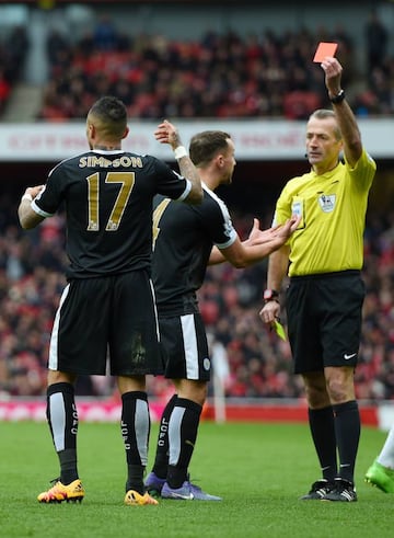 Danny Simpson receiving his marching orders from Martin Atkinson