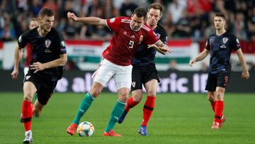 Soccer Football - Euro 2020 Qualifier - Group E - Hungary v Croatia - Groupama Arena, Budapest, Hungary - March 24, 2019 Hungary's Adam Szalai in action with Croatia's Ivan Rakitic REUTERS/Bernadett Szabo