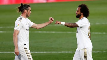 Soccer Football - La Liga Santander - Real Madrid v Eibar - Alfredo Di Stefano Stadium, Madrid, Spain - June 14, 2020   Real Madrid&#039;s Marcelo and Gareth Bale celebrate after the match, as play resumes behind closed doors following the outbreak of the