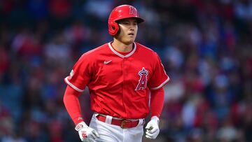Mar 28, 2023; Anaheim, California, USA; Los Angeles Angels designated hitter Shohei Ohtani (17) reaches first on a walk against the Los Angeles Dodgers during the third inning at Angel Stadium. Mandatory Credit: Gary A. Vasquez-USA TODAY Sports