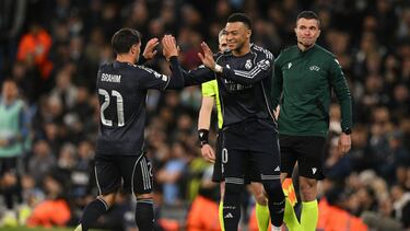 Real Madrid's French forward #10 Kylian Mbappe (C) comes on for Real Madrid's Moroccan forward #21 Brahim Diaz (L) during the UEFA Champions League, round of 16 second leg football match between Manchester City and Real Madrid at the Etihad Stadium in Manchester, north west England, on March 17, 2026. (Photo by Oli SCARFF / AFP)