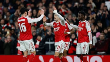 Soccer Football - FA Cup - Fourth Round - Arsenal v Wigan Athletic - Emirates Stadium, London, Britain - February 15, 2026 Arsenal's Gabriel Martinelli celebrates scoring their second goal with Christian Norgaard and Bukayo Saka Action Images via Reuters/Peter Cziborra
