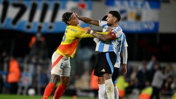 Colombia's midfielder #06 Richard Rios argues with Argentina's defender #19 Nicolas Otamendi during the 2026 FIFA World Cup South American qualifiers football match between Argentina and Colombia at the Mas Monumental stadium in Buenos Aires, on June 10, 2025. (Photo by Luis ROBAYO / AFP)