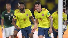 Colombia's Mateus Uribe (R) celebrates after scoring against Bolivia during their South American qualification football match for the FIFA World Cup Qatar 2022, at the Metropolitano Roberto Melendez stadium in Barranquilla, Colombia, on March 24, 2022. (Photo by Raul ARBOLEDA / AFP)