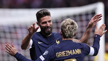France's forward #09 Olivier Giroud celebrates with France's forward #07 Antoine Griezmann after scoring a goal during the UEFA EURO 2024 Group B qualifying football match between France and Gibraltar at the Allianz Riviera stadium in Nice, southeastern France, on November 18, 2023. (Photo by FRANCK FIFE / AFP)