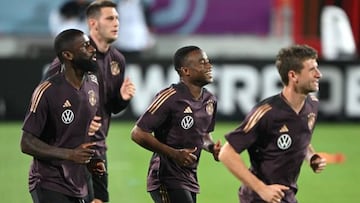 (From L to R): Germanys defender Antonio Ruediger, Germanys forward Thomas Mueller, Germanys forward Youssoufa Moukoko and Germanys defender Niklas Suele attend a training session at Al Shamal Stadium in Al Shamal, north of Doha on November 20, 2022, ahead of the Qatar 2022 World Cup football tournament. (Photo by INA FASSBENDER / AFP) (Photo by INA FASSBENDER/AFP via Getty Images)