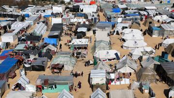 Displaced Palestinians, who fled their houses due to Israeli strikes, take shelter in a tent camp, amid the ongoing conflict between Israel and Hamas, in Rafah, in the southern Gaza Strip, February 14, 2024. REUTERS/Ibraheem Abu Mustafa