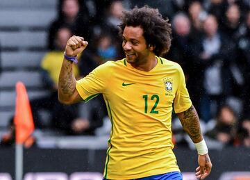 Brazil's defender Marcelo reacts after scoring a goal during the football match between Brasil and Japan at the Pierre-Mauroy Stadium in Villeneuve d'Ascq, near Lille, northern France, on November  10, 2017